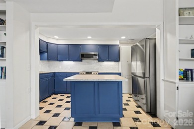 Own a piece of Charlotte history in this unique Mid-Century