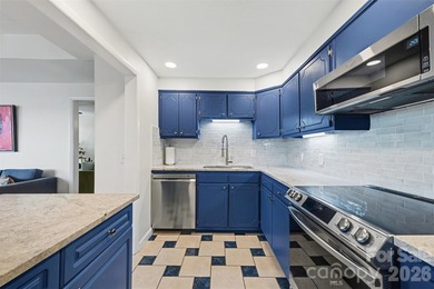 Own a piece of Charlotte history in this unique Mid-Century