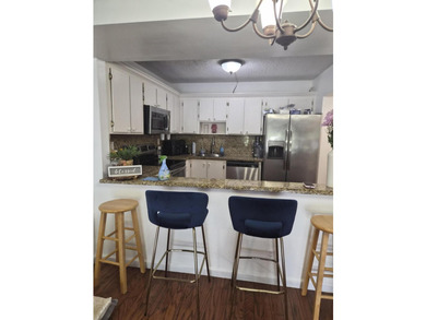 Welcome to this well-appointed 2-bedroom, 2-bathroom condominium - photo 8
