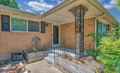 ADA compliant! Experience refined living at 1732 Hilltop Drive