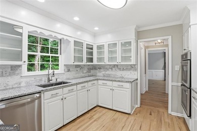 Nestled on nearly half an acre in a quiet cul-de-sac, this - photo 11