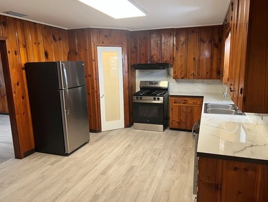 This beautifully updated 3-bedroom, 2-bath home features a - photo 8