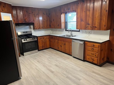 This beautifully updated 3-bedroom, 2-bath home features a - photo 9