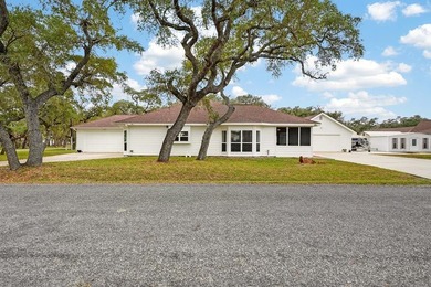 Nestled on a nicely landscaped spacious .66-acre corner lot in - photo 1