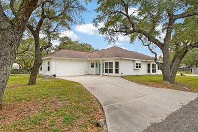 Nestled on a nicely landscaped spacious .66-acre corner lot in - photo 4
