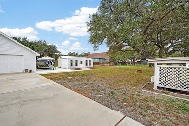 Nestled on a nicely landscaped spacious .66-acre corner lot in - photo 6