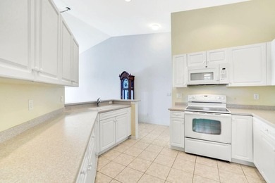 Experience stunning lake views from this beautiful condo in Port - photo 8