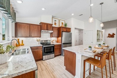 TOUR THIS STUNNING FORMER MODEL HOME TODAY! This home includes 3 - photo 7