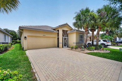 Welcome to 9575 Sandpiper Shores Way in the sought-after - photo 1