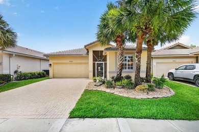 Welcome to 9575 Sandpiper Shores Way in the sought-after - photo 2