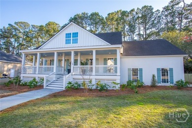 This exceptional Isle of Hope residence offers refined living on - photo 1