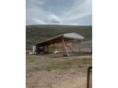 Large RV lot located in Sweetwater Camper and Trailer Park. Full - photo 1