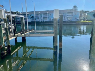 Boat slip with 10,000 lb lift available for sale!  Must own a - photo 1