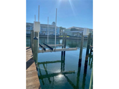 Boat slip with 10,000 lb lift available for sale!  Must own a - photo 2