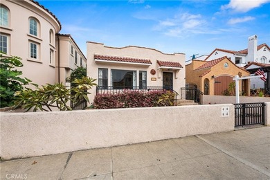 This 1924 low profile Spanish bungalow is located in one of the - photo 4