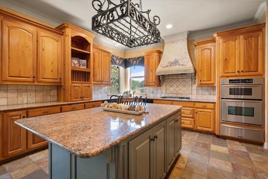 Welcome to luxury living in the prestigious gated community of - photo 11