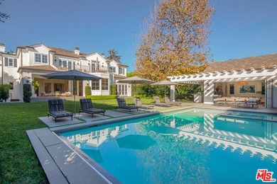 Situated on an over 18,000-square-foot lot in the heart of the - photo 1