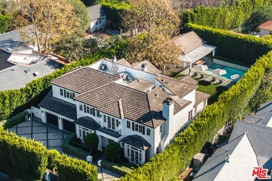Situated on an over 18,000-square-foot lot in the heart of the - photo 2