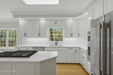 Take a look at this completely remodeled, three-level, all-brick - photo 11