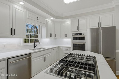 Take a look at this completely remodeled, three-level, all-brick - photo 12