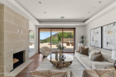 Perched high in the prestigious Tatum Canyon, this modern