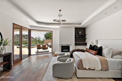 Perched high in the prestigious Tatum Canyon, this modern