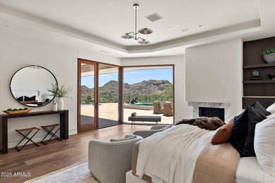 Perched high in the prestigious Tatum Canyon, this modern