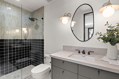 Perched high in the prestigious Tatum Canyon, this modern