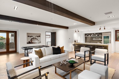 Perched high in the prestigious Tatum Canyon, this modern