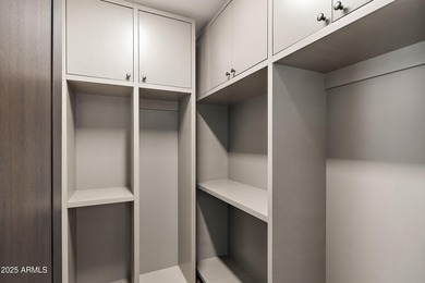 Perched high in the prestigious Tatum Canyon, this modern