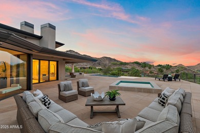 Perched high in the prestigious Tatum Canyon, this modern
