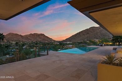 Perched high in the prestigious Tatum Canyon, this modern