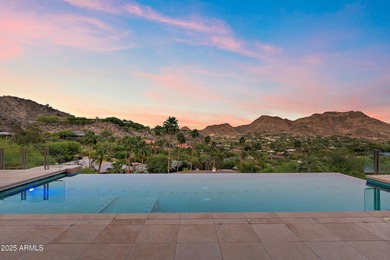 Perched high in the prestigious Tatum Canyon, this modern