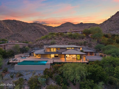 Perched high in the prestigious Tatum Canyon, this modern