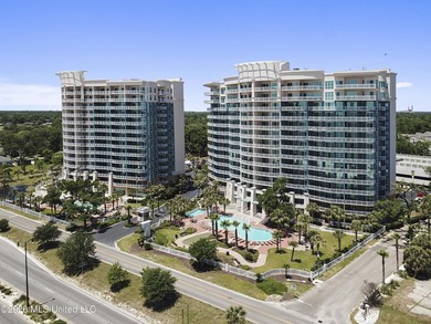 EXPERIENCE ULTIMATE COASTAL LUXURY IN THIS STUNNING BEACHFRONT - photo 1