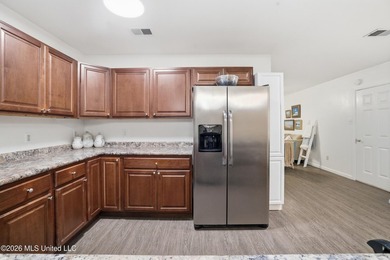 Welcome home to this surprisingly spacious 4 bedroom, 2 bath - photo 10