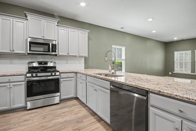 Welcome to this spacious 5-bedroom, 3.5-bath Kensington floor - photo 11