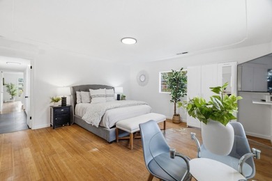Ideally located on a quiet residential street in the highly - photo 11