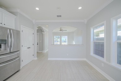 This stylishly crafted home in desirable Sea Oaks Village - photo 11
