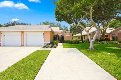 Welcome to this charming 2-bedroom, 2-bathroom villa located in - photo 2