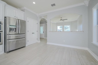 This stylishly crafted home in desirable Sea Oaks Village - photo 13