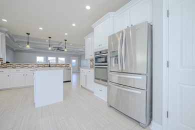 This stylishly crafted home in desirable Sea Oaks Village - photo 15