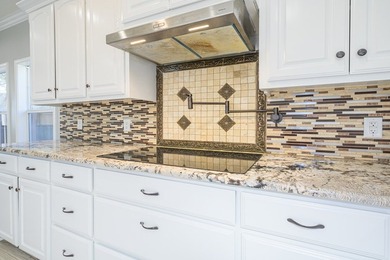 This stylishly crafted home in desirable Sea Oaks Village - photo 19