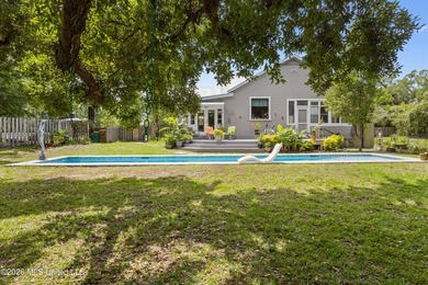 Tucked beneath a canopy of majestic live oaks on coveted Second - photo 1