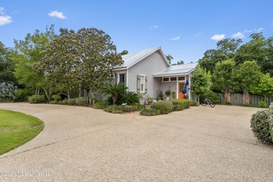 Tucked beneath a canopy of majestic live oaks on coveted Second - photo 4