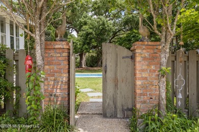 Tucked beneath a canopy of majestic live oaks on coveted Second - photo 5