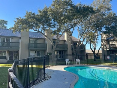 Boasting an exceptional view of the sparkling community pool - photo 22