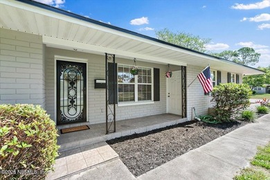 Welcome to this charming 3BR/2BA solid brick home on a spacious - photo 3