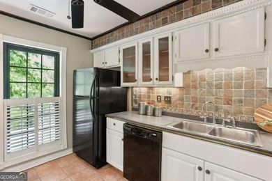 Is there a 2-bed condo in Buckhead under $250K with resort-style