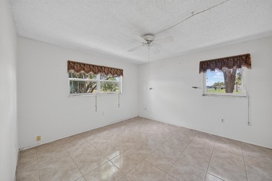 Desirable first-floor end unit in Sunrise Lakes Phase One! This - photo 7